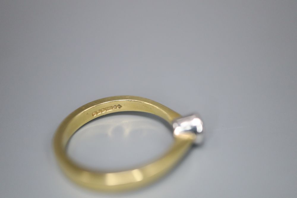 A small 18ct gold solitaire diamond ring, size H